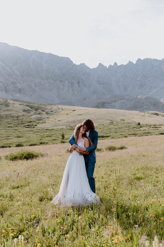 Bride and groom portraits in the mountains of Summit County, Colorado