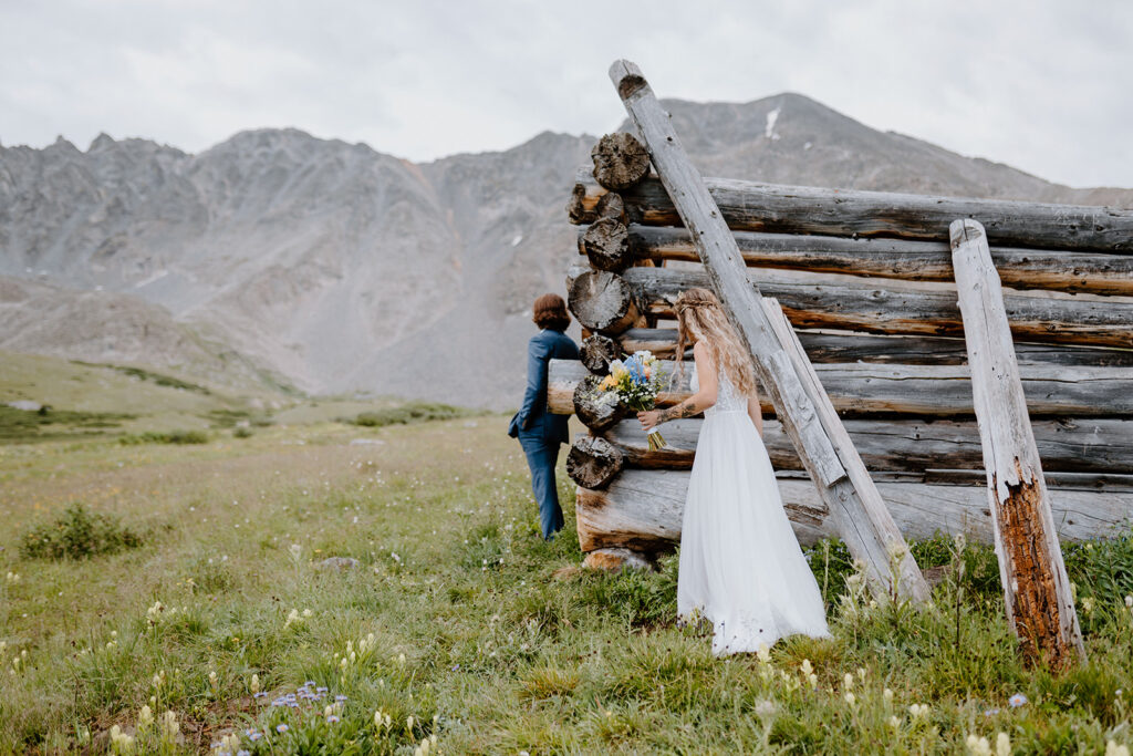 First-look by a half-built log cabin in Breckenridge Colorado