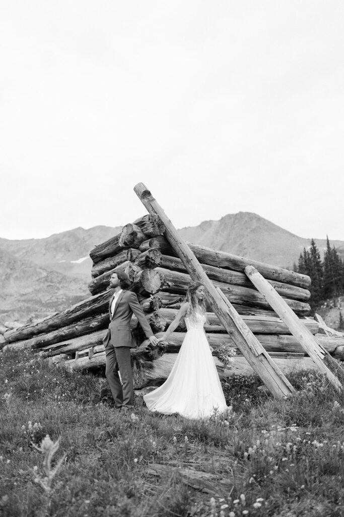 First-look by a half-built log cabin in Breckenridge Colorado