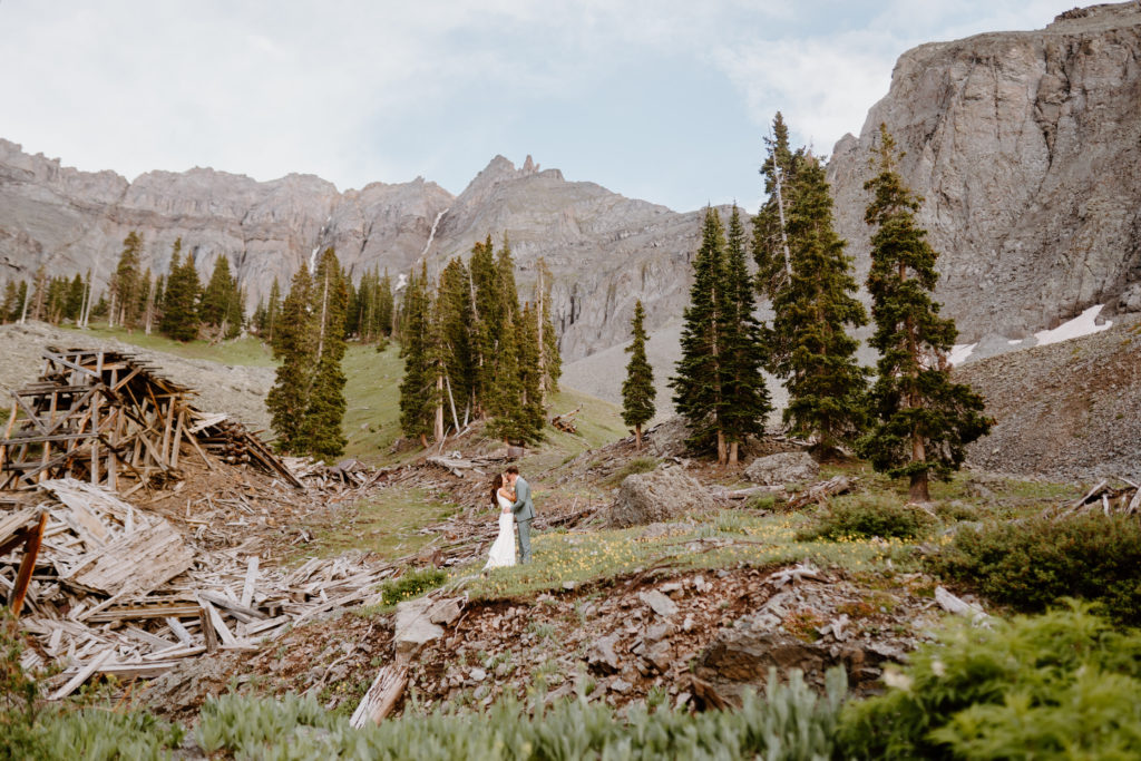 Couple at the base of Alta Lakes Observatory on their weddng day