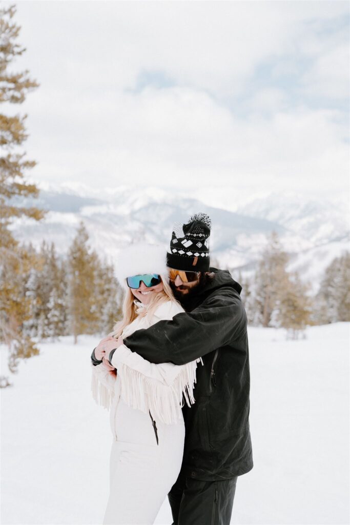 snowy engagement in the Colorado mountains