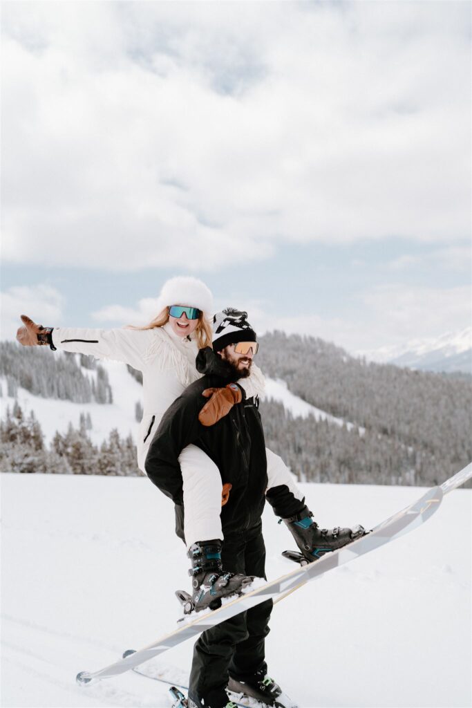Fun and playful engagement photos in the mountains filled with adventurous moments