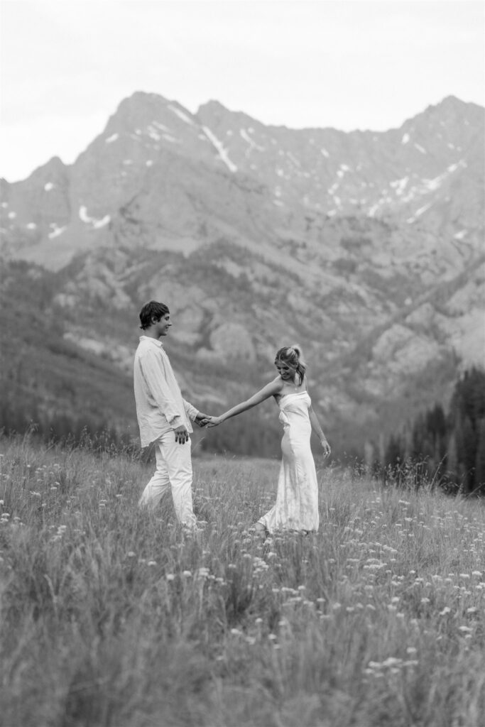 couple photos in wildflower meadow