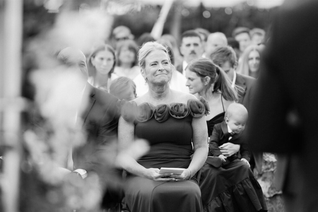Mother of the bride tears up as bride walks down the aisle