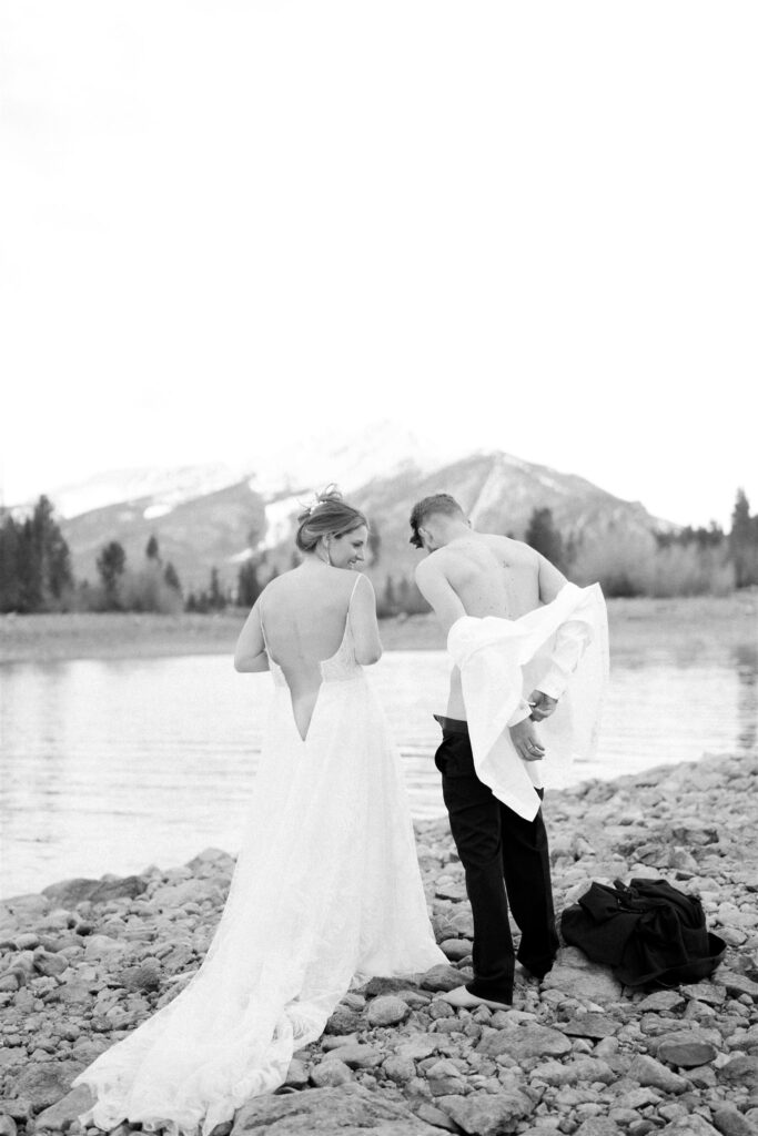Bride and groom get adventurous and skinny dip in a Colorado alpine lake