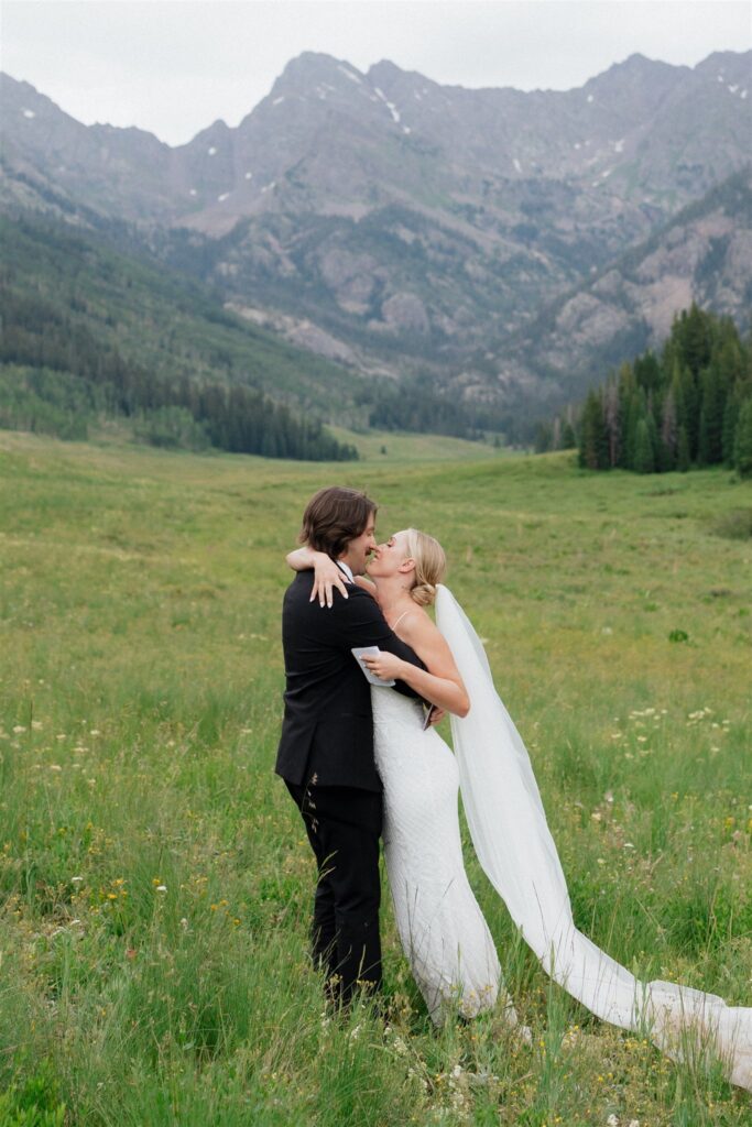 Bride and groom read their vows for their Colorado micro wedding