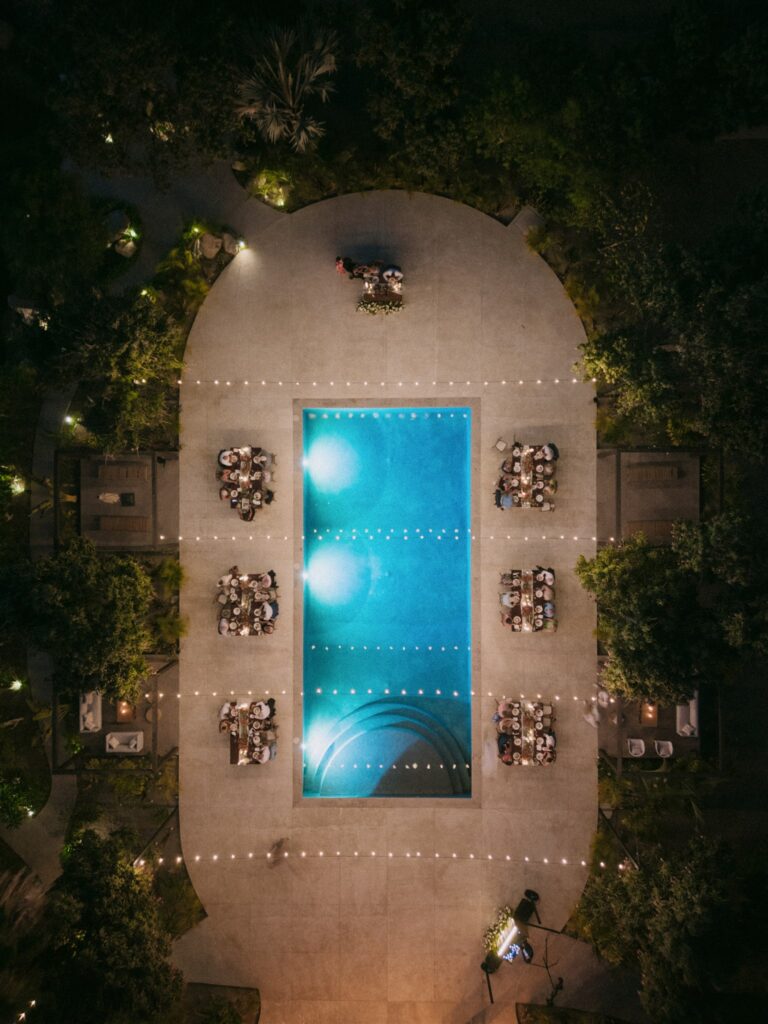 A drone shot of the pool and reception space at Baja Luna