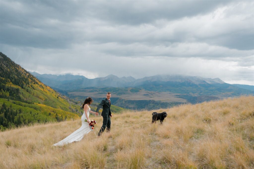 Stormy Colorado wedding photos in the mountains with their dog