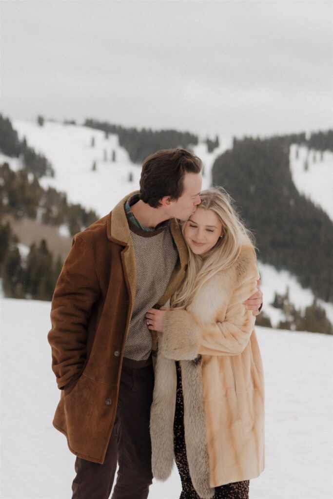 Cold and snowy engagement photos on Vail Mountain