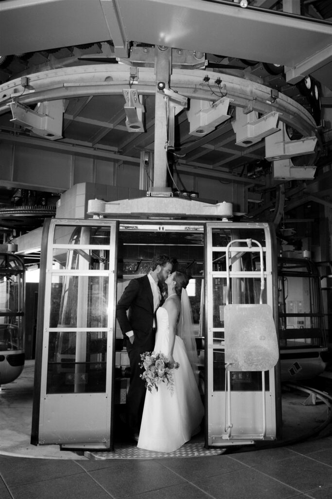 Bride and groom ride the gondola up to Vail Mountain Wedding Deck