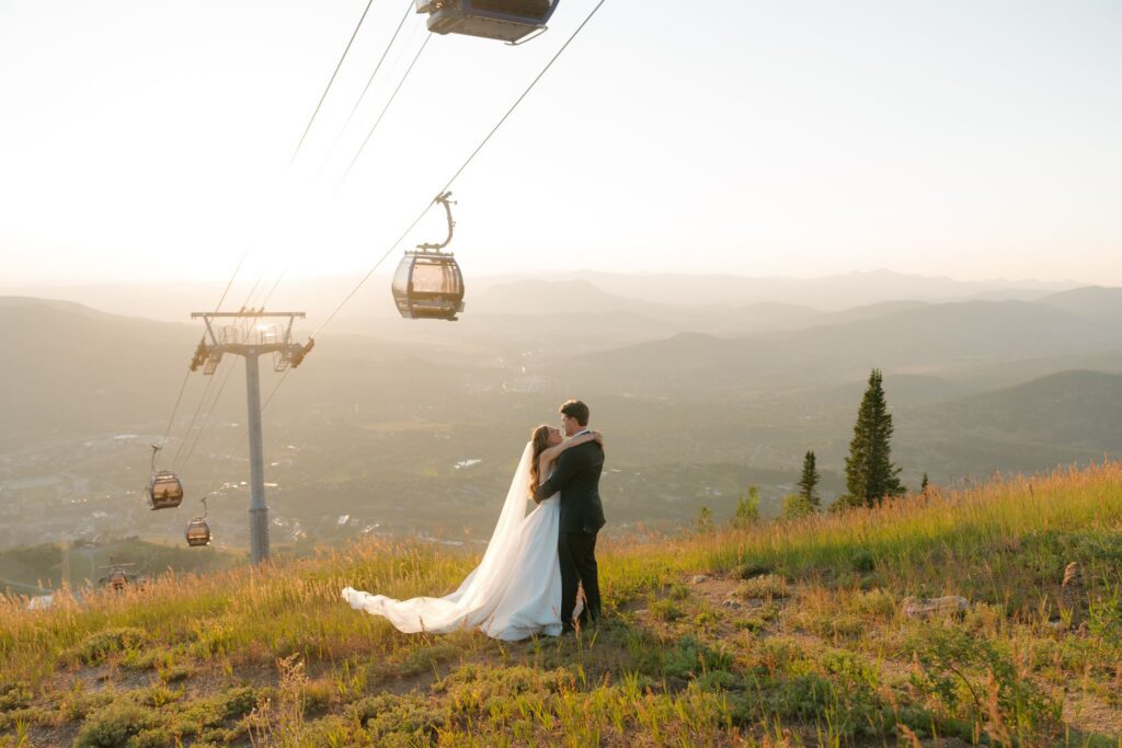 Mountaintop wedding portraits in Steamboat Springs at sunset